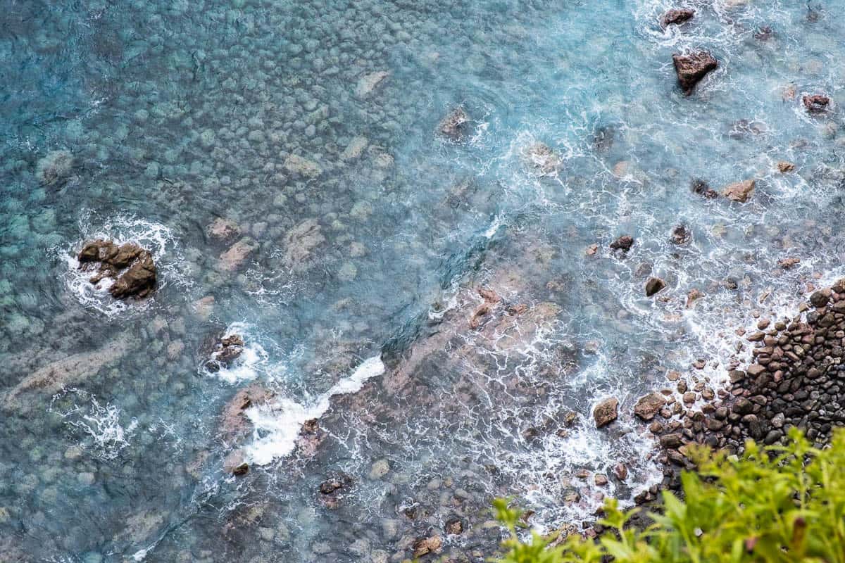Aerial view of tide pools among volcanic rocks at Pocas das Lesmas