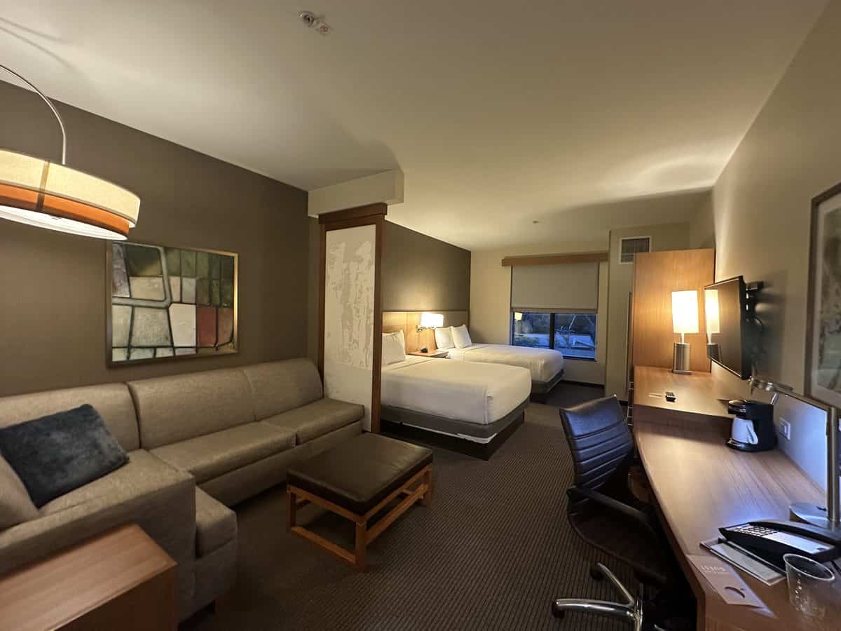 Hotel room at Hyatt Place Moab with two queen beds and a sofa sleeper