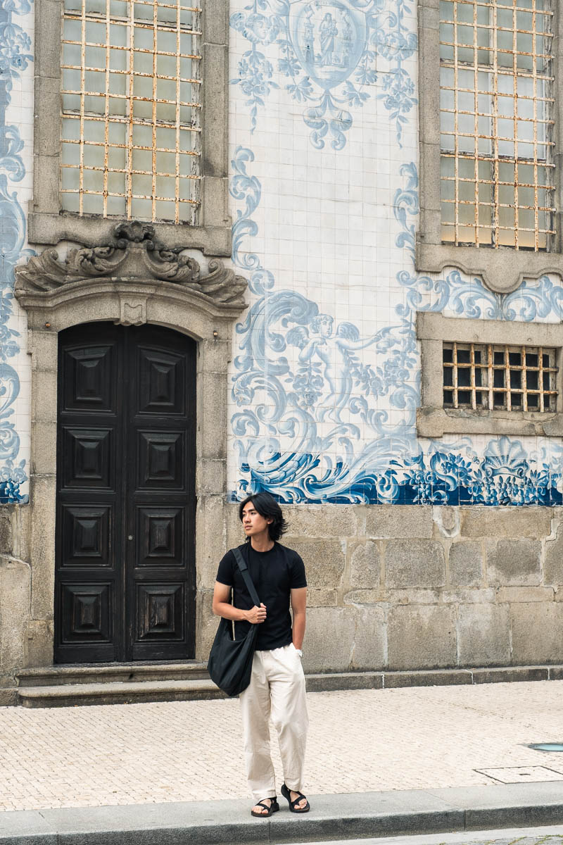 Blue and white tiled side wall of Igreja do Carmo in Porto