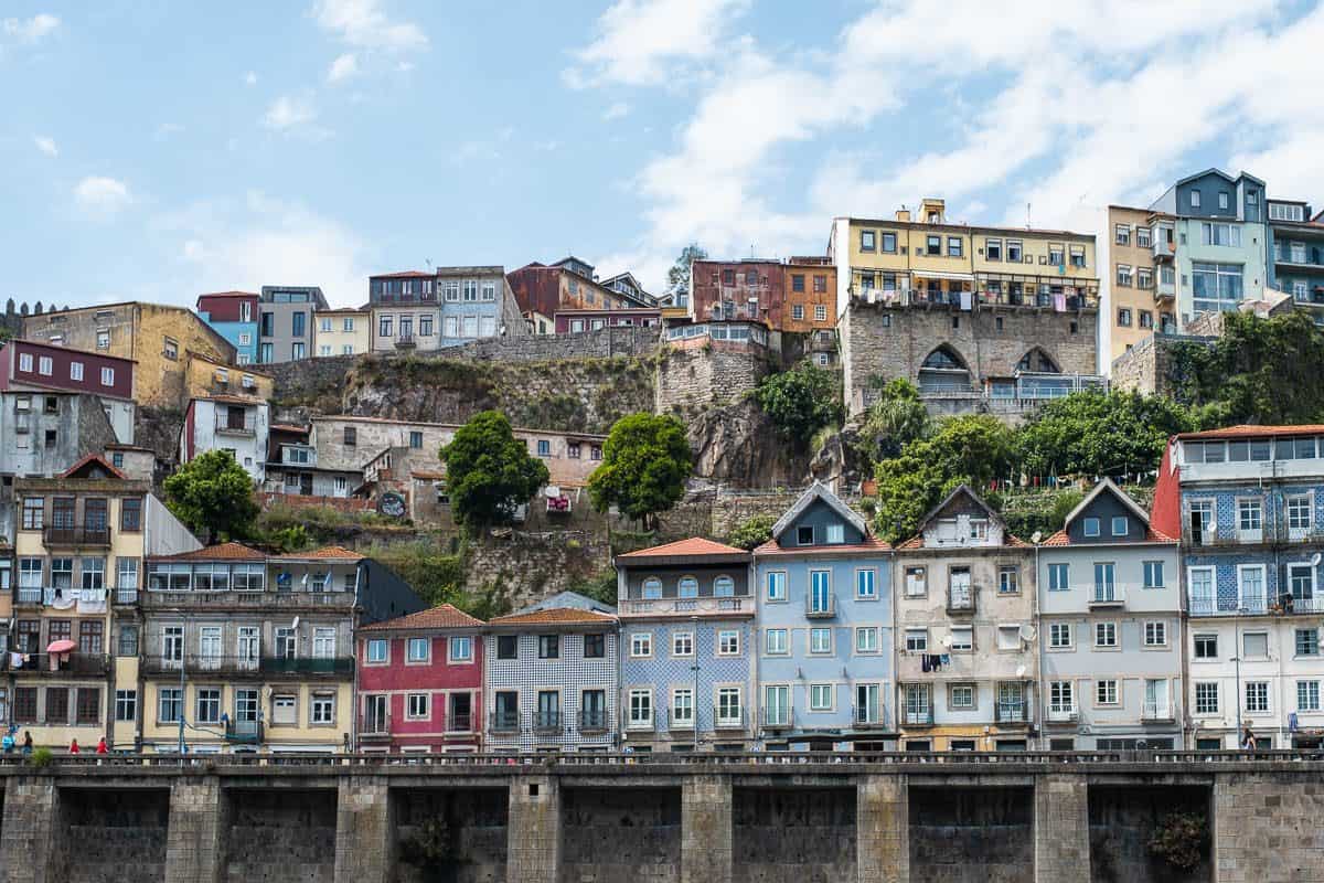 Colorful hillside houses along the Porto riverfront near Ribeira