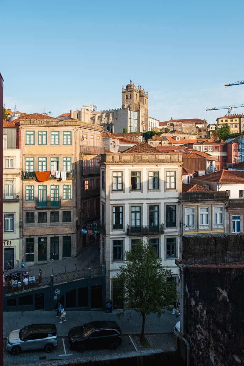 Porto rooftops and tiled facades below the cathedral, seen from a viewpoint terrace